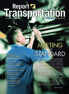 Report on Transportation front cover showing an employee in coveralls working under a truck